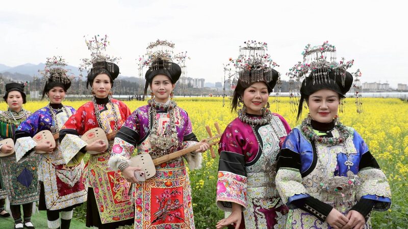 Golden Runway: Guizhou Villagers Shine in Rapeseed Fields 🌼✨