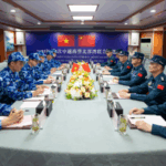 DEAP2IO6KC63FW90QA4B - 🌍NewspaperAmigo – Your Global News Buddy 🗞️ China & Vietnam Boost Maritime Ties in Joint Coast Guard Patrol 🌊🛳️