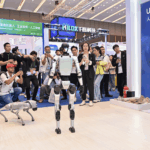 DL3PWS7AIRL5HODGLYOK - 🌍NewspaperAmigo – Your Global News Buddy 🗞️ China’s Tech Titans Race to Rule Humanoid Robots 🤖✨