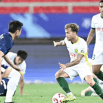 EOGF1UWR7JVDM5VOM03Q - 🌍NewspaperAmigo – Your Global News Buddy 🗞️ Wuhan Three Towns Stun Beijing Guoan with Epic 3-Goal Comeback in Final Minutes! ⚽🔥
