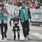 Humanoid_Robots_Race_in_Beijing_s_First_AI_Marathon