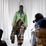 JV8HXATVM0RV1Q0UMJ0O - 🌍NewspaperAmigo – Your Global News Buddy 🗞️ African Designers Shine in Shanghai 🌍👗 video poster