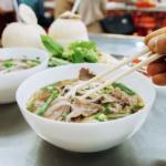 LLU3XR78YY2HUP96YWKM - 🌍NewspaperAmigo – Your Global News Buddy 🗞️ Savoring Vietnam: Street Food & Coffee Culture During Tet 🍜☕