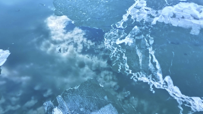 Xinjiang's Ulungur Lake Awakens as Ice Transforms into Naan-Shaped Art 🌊❄️ video poster