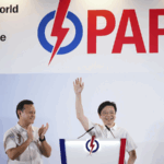 5EMISL6B2INVPD4XXTRO - 🌍NewspaperAmigo – Your Global News Buddy 🗞️ Singapore’s PAP Wins Majority in Pivotal Election 🗳️🇸🇬