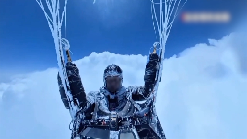 7TBWHP69RFVN3CH3L16V - 🌍NewspaperAmigo – Your Global News Buddy 🗞️ Chinese Paraglider Survives 8,598m Altitude Ordeal 🌪️✈️