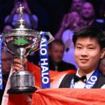 AK8HRA1CMEY7K5ATFEGQ - 🌍NewspaperAmigo – Your Global News Buddy 🗞️ Zhao Xintong Makes History as First Asian World Snooker Champion 🏆