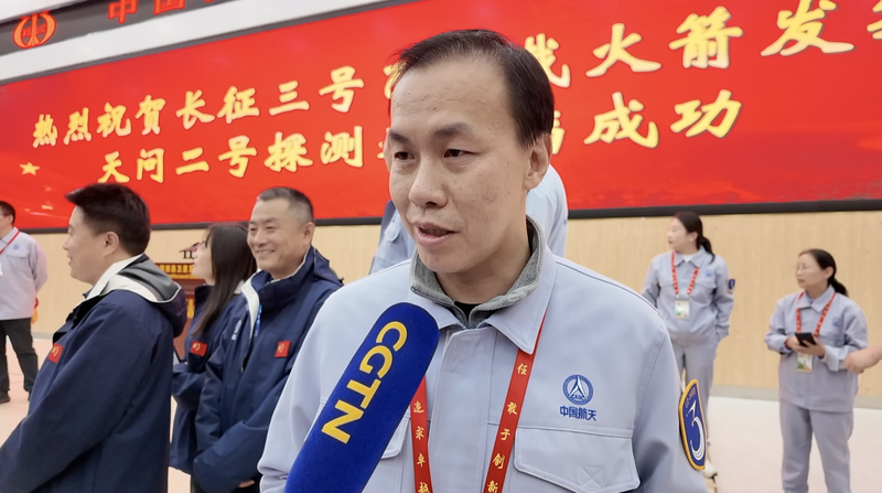CW1Y7XBWPB6KVCYLBLGD - 🌍NewspaperAmigo – Your Global News Buddy 🗞️ China’s Tianwen-2 Blasts Off on Decade-Long Asteroid Quest 🚀🌌 video poster