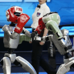 F22UZLFFYOF2GJJHVTLJ - 🌍NewspaperAmigo – Your Global News Buddy 🗞️ 🤖🥊 World's First Humanoid Robot Boxing Match Kicks Off in China! video poster