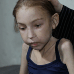 Gaza_Girl_s_Plea___I_Just_Want_to_Be_a_Child_Again__poster - 🌍NewspaperAmigo – Your Global News Buddy 🗞️ Gaza_Girl_s_Plea___I_Just_Want_to_Be_a_Child_Again_ video poster