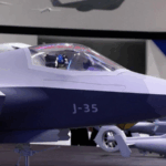 ILLWZ7B1S00FUWKOZ533 - 🌍NewspaperAmigo – Your Global News Buddy 🗞️ China’s J-35 Stealth Fighter: A Game-Changer for Naval Power 🌊✈️💥 video poster