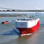 IRNRJNGMIO63QR6HRMF0 - 🌍NewspaperAmigo – Your Global News Buddy 🗞️ China Sets Sail with World’s Largest Car Carrier 🌍⚡