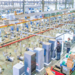 NHU9WQ8P8T1LWMV6V58L - 🌍NewspaperAmigo – Your Global News Buddy 🗞️ China's Factories Go Turbo: AI Boosts Production to New Heights 🚀🏭