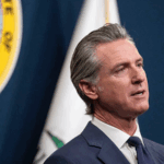 P7JXRYIW462061ZZMJFP - 🌍NewspaperAmigo – Your Global News Buddy 🗞️ Trump Tariffs Hit Small Biz: CA Governor Sounds Alarm 🚨