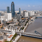 QV0HTPLFYAL9U5YFIXU2 - 🌍NewspaperAmigo – Your Global News Buddy 🗞️ Sanjiangkou: Where Ningbo’s Maritime Past Dances with Neon Futures 🌉✨ video poster