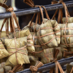 TYKT4D7KRDIALPZDEH80 - 🌍NewspaperAmigo – Your Global News Buddy 🗞️ 🍙 Daojiao’s Zongzi Tradition Spices Up Dragon Boat Fest in Guangdong!