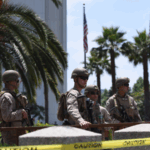 005PS1UDDYHE2HZNCPAS - 🌍NewspaperAmigo – Your Global News Buddy 🗞️ U.S. Marines Detain Protester in LA as Tensions Rise Over Military Parade 🚨🇺🇸