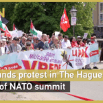 07216PY6VCE4C4MS77Q0 - 🌍NewspaperAmigo – Your Global News Buddy 🗞️ Thousands Rally Against NATO in The Hague Ahead of Key Summit 🕊️✊ video poster