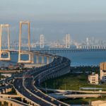 0V2JLVGDQIXOFE2ET7JL - 🌍NewspaperAmigo – Your Global News Buddy 🗞️ Shenzhen-Zhongshan Link Boosts Greater Bay Area Growth 🌉🚀