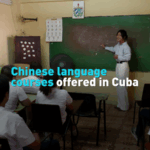 BPUI9Z8ANWRA0HJE6OJT - 🌍NewspaperAmigo – Your Global News Buddy 🗞️ Mandarin Fever Hits Havana: Cuban Teens Master Chinese 🌏📚 video poster