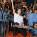 E0FOGRDIWUGBJKJK6ZNA - 🌍NewspaperAmigo – Your Global News Buddy 🗞️ MIYAVI Rocks Refugee Support: Music as a Global Mission 🎸🌍 video poster