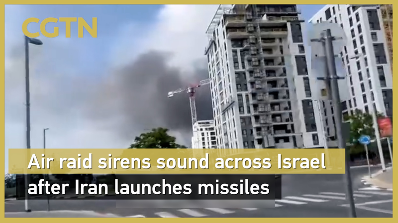 Iran Launches Missiles at Israel: Tensions Escalate 🌍🚨 video poster