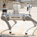 GI7XNFB38GM4H4OLOD3L - 🌍NewspaperAmigo – Your Global News Buddy 🗞️ 🤖 AI-Powered Robot Dog Joins Film Studio Security in Ningxia 🎥