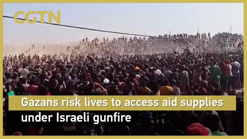 GPWJIG9DGOKE3AF9JFQ0 - 🌍NewspaperAmigo – Your Global News Buddy 🗞️ Gazans Brave Gunfire for Aid: A Desperate Struggle 🚨 video poster