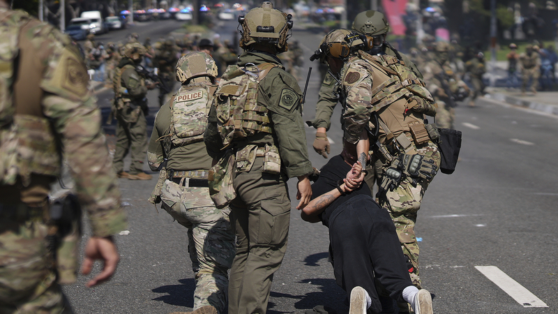 IP9WFRGS3DMW3LGB585Y - 🌍NewspaperAmigo – Your Global News Buddy 🗞️ Trump Deploys Troops as LA Immigration Raids Ignite Protests 🚨🇺🇸