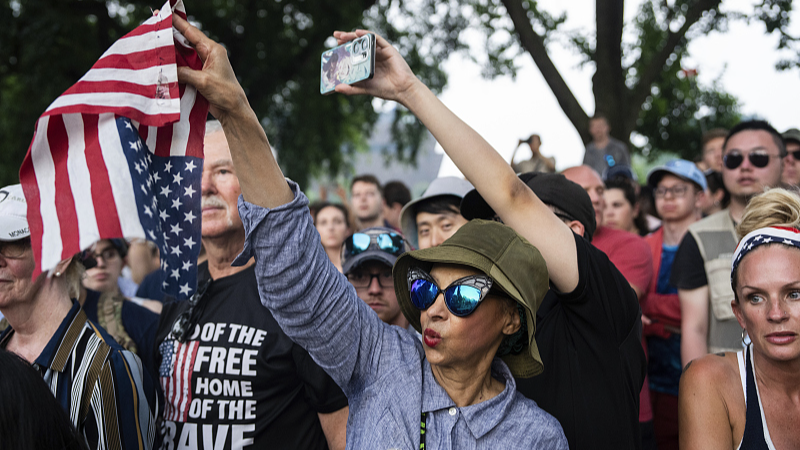 L2O4CUA9OUE23UFTMOI1 - 🌍NewspaperAmigo – Your Global News Buddy 🗞️ Trump's 'Birthday Parade' Sparks Protests: What's the Cost? 🎉✊