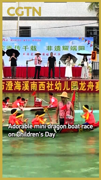LDJAS45ZBE8KIYW57P56 - 🌍NewspaperAmigo – Your Global News Buddy 🗞️ Tiny Paddlers, Big Fun: Kids Race Mini Dragon Boats 🐉🚣♂️ video poster