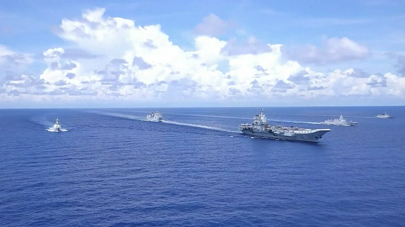 M9SDVEH2BIOVCMDVZUNU - 🌍NewspaperAmigo – Your Global News Buddy 🗞️ China's Shandong Aircraft Carrier Fleet Docks in Hong Kong for Historic Visit 🚢🇨🇳