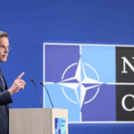 NATO_s_5__Defense_Push__Economic_Risks_Ahead_ - 🌍NewspaperAmigo – Your Global News Buddy 🗞️ NATO_s_5__Defense_Push__Economic_Risks_Ahead_