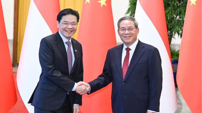 UE71AVQHSAGD0JRFW55U - 🌍NewspaperAmigo – Your Global News Buddy 🗞️ China & Singapore Boost Ties in Tech, Trade & Green Growth 🌱🤝