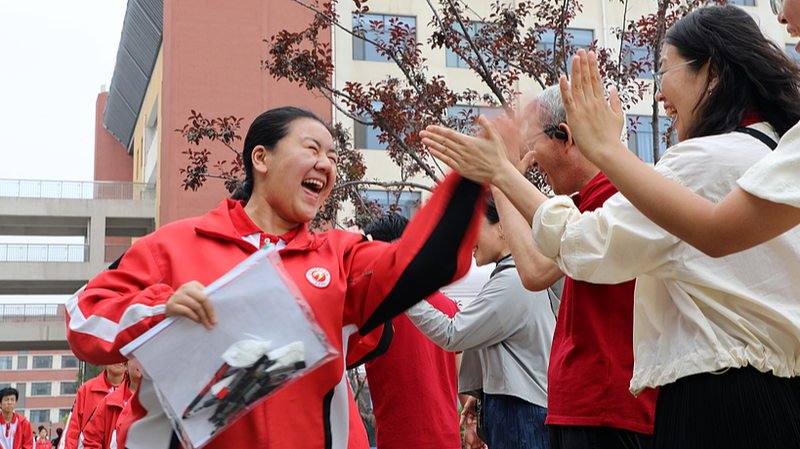 UPHQJJSO99TKAXCTG9CX - 🌍NewspaperAmigo – Your Global News Buddy 🗞️ Gaokao 2025 Kicks Off with Luck, Sunflowers & Solidarity 🌻🎓