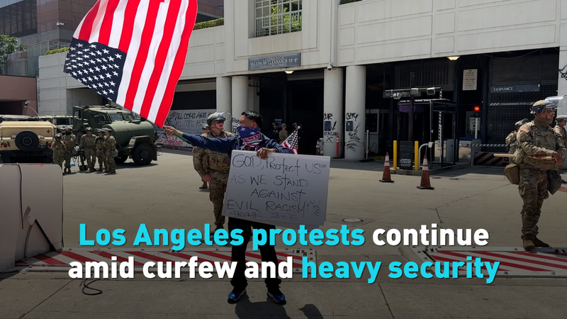 V49V457EIIQYGV7ZZ9QY - 🌍NewspaperAmigo – Your Global News Buddy 🗞️ LA Protests Intensify: Curfews, Troops, and Tensions Enter 7th Day 🌆✊ video poster