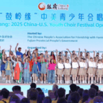 0QLOXBWFJO7JBU9BA4DG - 🌍NewspaperAmigo – Your Global News Buddy 🗞️ 🎶 China-U.S. Youth Choir Duet Goes Viral! 🌟 video poster