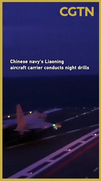 1SZ81A0MKLII879YB8ME - 🌍NewspaperAmigo – Your Global News Buddy 🗞️ Liaoning Aircraft Carrier Tests Night Ops in Pacific Drills 🌊✈️ video poster