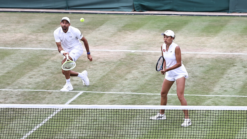 2ZA2T4YHBBEDA9QI787V - 🌍NewspaperAmigo – Your Global News Buddy 🗞️ Zhang Shuai & Arevalo Storm Into Wimbledon Semis 🎾