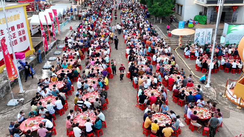 4GOYTJKZMBQU4S7A42PA - 🌍NewspaperAmigo – Your Global News Buddy 🗞️ Hainan's 'Village VA' Spikes Rural Revitalization with Volleyball & Banquets 🏐✨