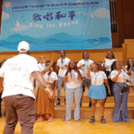 5W7TQ735EUXMAZF8KWVI - 🌍NewspaperAmigo – Your Global News Buddy 🗞️ 🎶 China-US Youth Choir Festival Strikes Chord for Peace 🌏 video poster