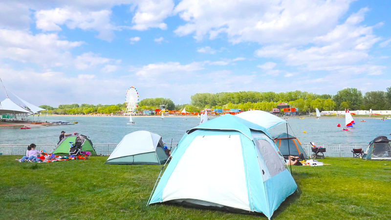 7SMAUDCT0GVY0TBYIRGK - 🌍NewspaperAmigo – Your Global News Buddy 🗞️ Beijing’s Olympic Park Splashes into Summer with Free Fun 🚣♂️🌞