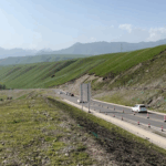 C57KJPX4QL4EACF3P6DN - 🌍NewspaperAmigo – Your Global News Buddy 🗞️ 🚗❄️🌞 Experience Four Seasons in a Day on Xinjiang's Duku Highway! video poster