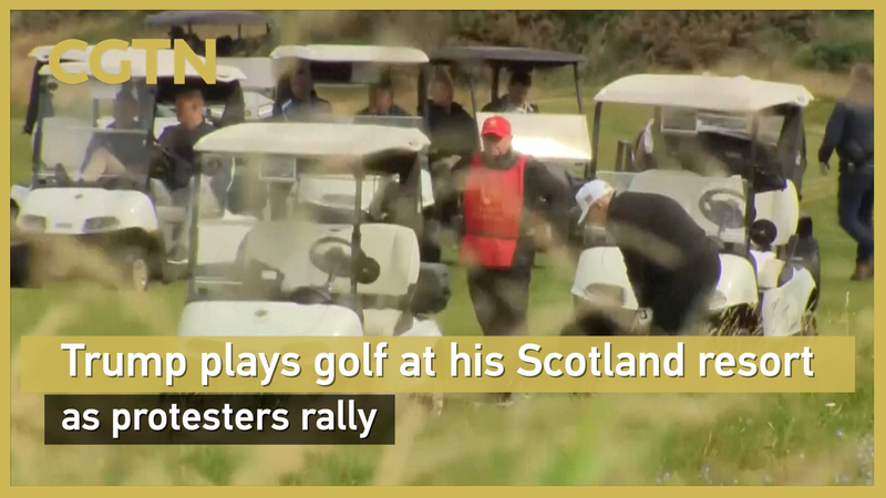 Trump Tees Off in Scotland Amid Protests 🏌️♂️✊ Trump Tees Off in Scotland Amid Protests 🏌️♂️✊ video poster