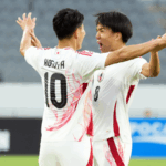 EJE1ATDX6T13NQYZH6LN - 🌍NewspaperAmigo – Your Global News Buddy 🗞️ China's Football Team Falls to Japan in East Asian Cup Clash ⚽🇯🇵