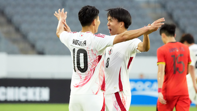 EJE1ATDX6T13NQYZH6LN - 🌍NewspaperAmigo – Your Global News Buddy 🗞️ China's Football Team Falls to Japan in East Asian Cup Clash ⚽🇯🇵