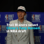 EREAWQBD4L1SMG5XLUKT - 🌍NewspaperAmigo – Your Global News Buddy 🗞️ 🏀 Trail Blazers Stun NBA Draft with Chinese Star Yang Hansen Pick! video poster