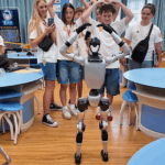F8HKNWVVYGNTGVBLGXKG - 🌍NewspaperAmigo – Your Global News Buddy 🗞️ U.S. Choir’s China Tour Hits High Note with Robot Friends! 🎤🤖 video poster