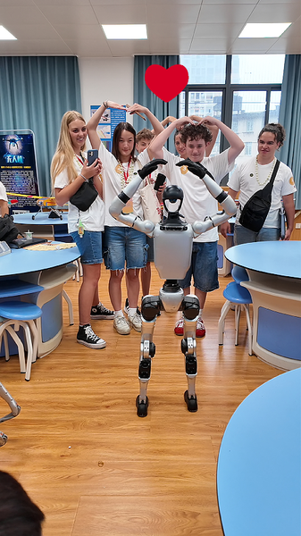 F8HKNWVVYGNTGVBLGXKG - 🌍NewspaperAmigo – Your Global News Buddy 🗞️ U.S. Choir’s China Tour Hits High Note with Robot Friends! 🎤🤖 video poster