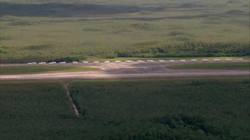 H009J0JBJGSM5Q327TUP - 🌍NewspaperAmigo – Your Global News Buddy 🗞️ Florida's 'Alligator Alcatraz' Sparks Protests Over Migrant Detention Plans 🚫🏗️ video poster